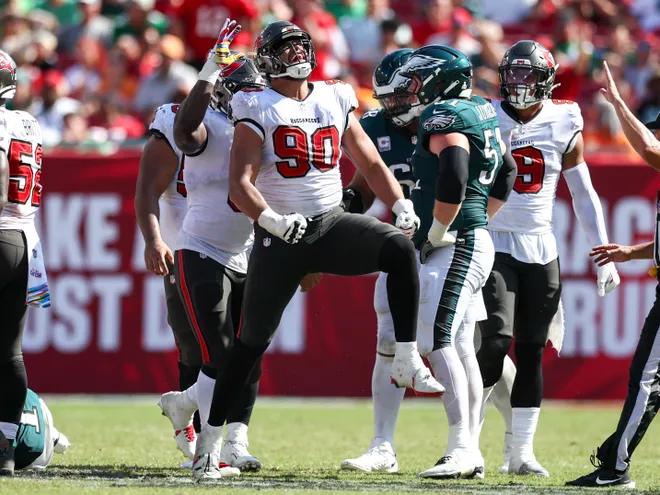 Sep 29, 2024; Tampa, Florida, USA; Tampa Bay Buccaneers defensive end Logan Hall (90) reacts after a sack against the Philadelphia Eagles in the fourth quarter at Raymond James Stadium. Mandatory Credit: Nathan Ray Seebeck-Imagn Images