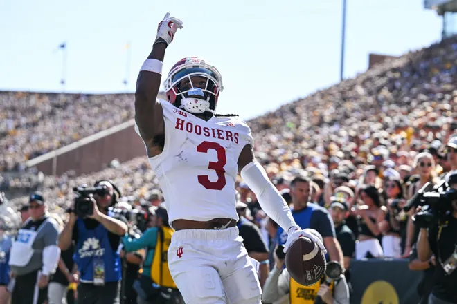 Sep 27, 2025; Iowa City, Iowa, USA; Indiana Hoosiers wide receiver Omar Cooper Jr. (3) reacts after a touchdown reception against the Iowa Hawkeyes during the first quarter at Kinnick Stadium. Mandatory Credit: Jeffrey Becker-Imagn Images