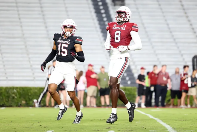 COLUMBIA, SOUTH CAROLINA - APRIL 18: Nyck Harbor #8 of the South Carolina Gamecocks and Brandon Cisse #15 of the South Carolina Gamecocks run down the field toward the play during the Garnet and Black Spring Game at Williams-Brice Stadium on April 18, 2025 in Columbia, South Carolina. (Photo by Katie Januck/Getty Images for ONIT)