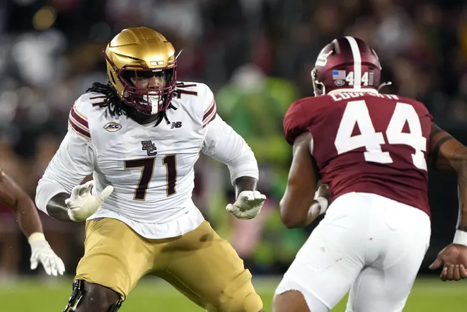 Sep 13, 2025; Stanford, California, USA; Boston College Eagles offensive lineman Jude Bowry (71) blocks against Stanford Cardinal linebacker Ernest Cooper (44) during the second quarter at Stanford Stadium. Mandatory Credit: Darren Yamashita-Imagn Images