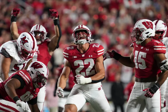 Aug 28, 2025; Madison, Wisconsin, USA; Wisconsin Badgers linebacker Mason Reiger (22) celebrates a play during the game against the Miami (OH) RedHawks at Camp Randall Stadium. Mandatory Credit: Jeff Hanisch-Imagn Images
