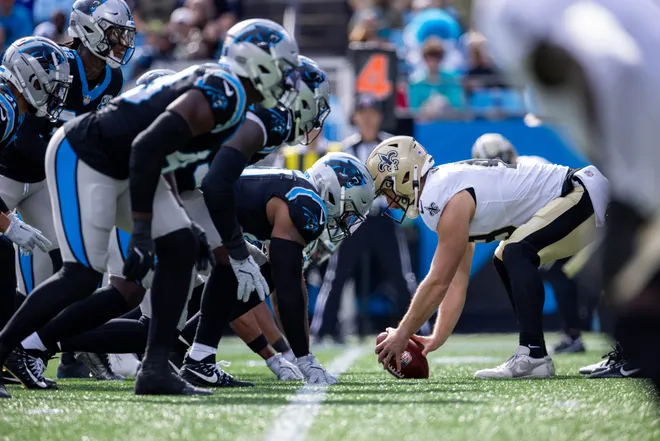 Nov 3, 2024; Charlotte, North Carolina, USA; Carolina Panthers line up against New Orleans Saints long snapper Zach Wood (49) during a punt in the second quarter at Bank of America Stadium. Mandatory Credit: Scott Kinser-Imagn Images