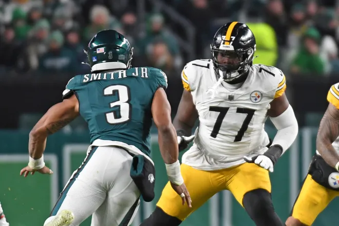 Pittsburgh Steelers offensive tackle Broderick Jones (77) blocks Philadelphia Eagles linebacker Nolan Smith Jr.