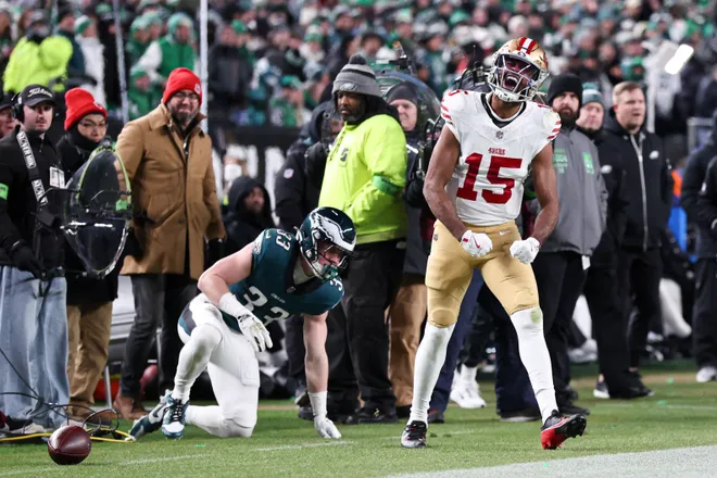 Jan 11, 2026; Philadelphia, PA, USA; San Francisco 49ers wide receiver Jauan Jennings (15) reacts in front of Philadelphia Eagles cornerback Cooper DeJean (33) after a first down catch in an NFC Wild Card Round game at Lincoln Financial Field. Mandatory Credit: Bill Streicher-Imagn Images