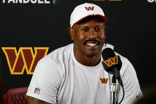 Jul 24, 2025; Ashburn, VA, USA; Washington Commanders outside linebacker Von Miller (24) speaks with the media after practice on day two of training camp at OrthoVirginia Training Center at Commanders Park. Mandatory Credit: Geoff Burke-Imagn Images