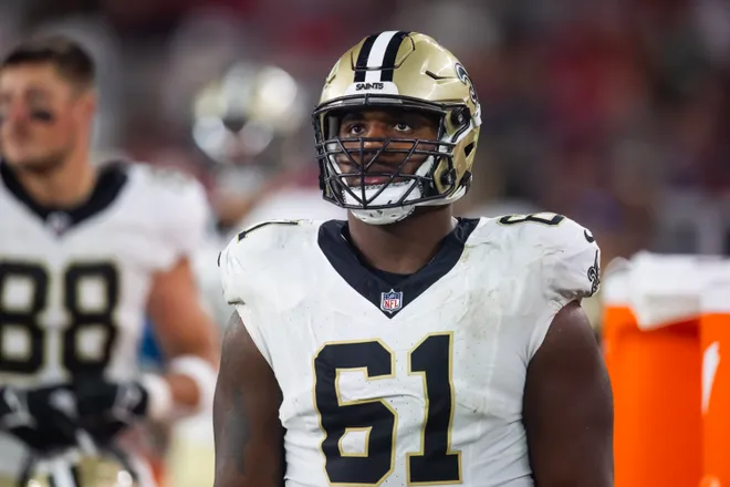 Aug 10, 2024; Glendale, Arizona, USA; New Orleans Saints center Sincere Haynesworth (61) against the Arizona Cardinals during a preseason NFL game at State Farm Stadium. Mandatory Credit: Mark J. Rebilas-USA TODAY Sports