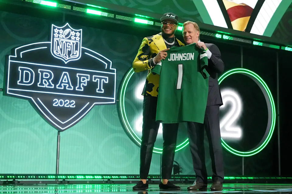 Apr 28, 2022; Las Vegas, NV, USA; Florida State defensive end Jermaine Johnson with NFL commissioner Roger Goodell after being selected as the twenty-sixth overall pick to the New York Jets during the first round of the 2022 NFL Draft at the NFL Draft Theater. Mandatory Credit: Kirby Lee-USA TODAY Sports