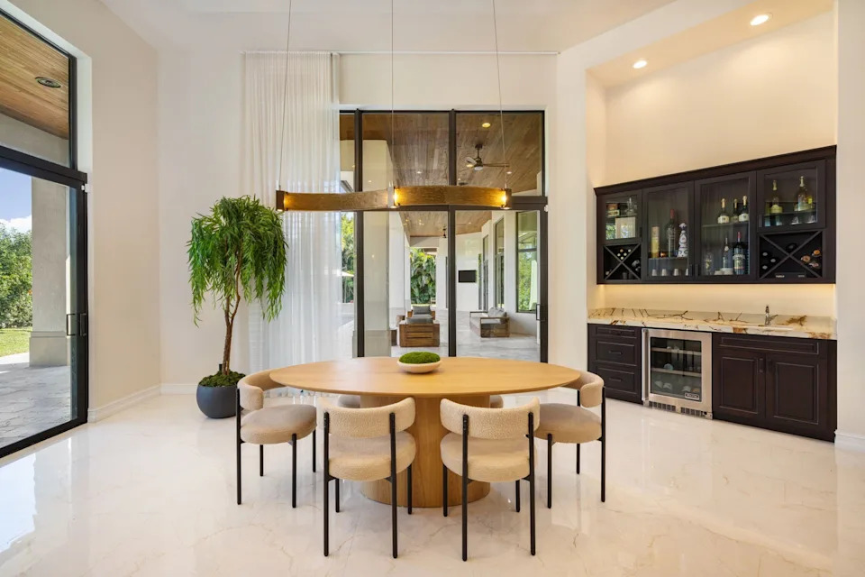 Round dining table in a home in Florida bought by NFL player Sterling Shepard