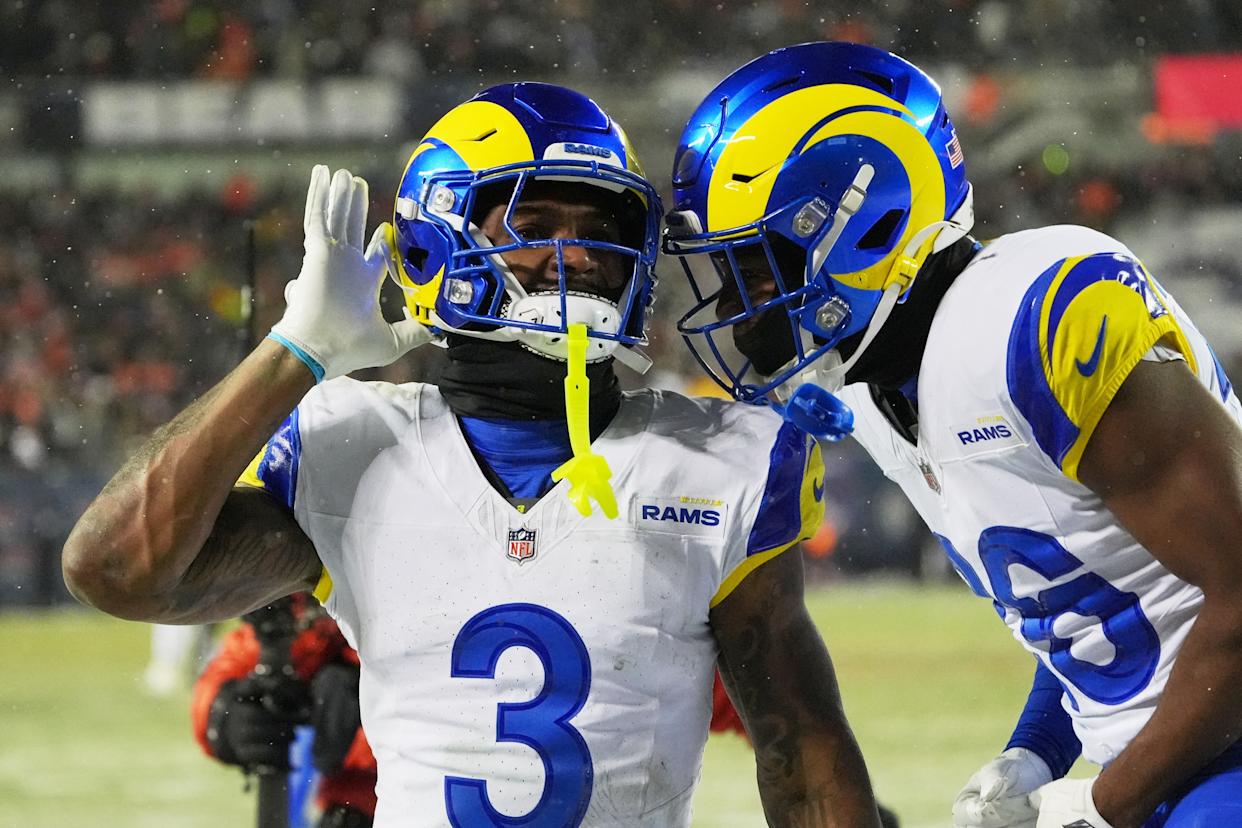 Jan 18, 2026; Chicago, IL, USA; Los Angeles Rams safety Kam Curl (3) acknowledges the crowd with safety Kamren Kinchens (26) after intercepting a pass intended for Chicago Bears wide...