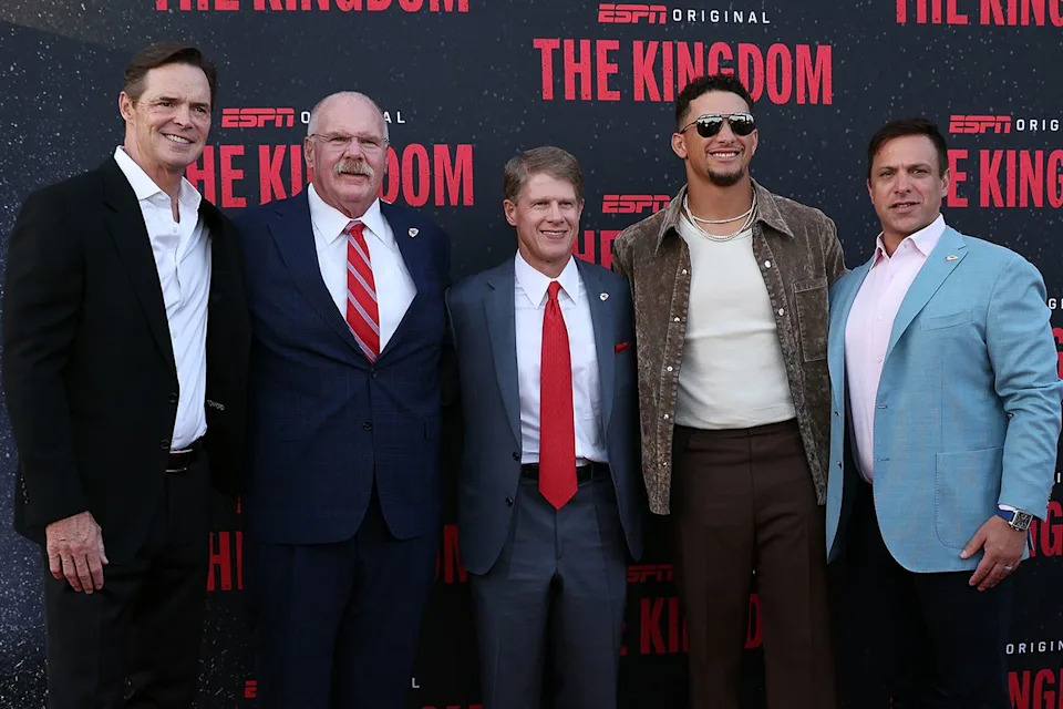 President Mark Donovan, Head Coach Andy Reid, Owner and CEO Clark Hunt, quarterback Patrick Mahomes and General Manager Brett Veach of the Kansas City Chiefs pose on the red carpet upon arrival for 