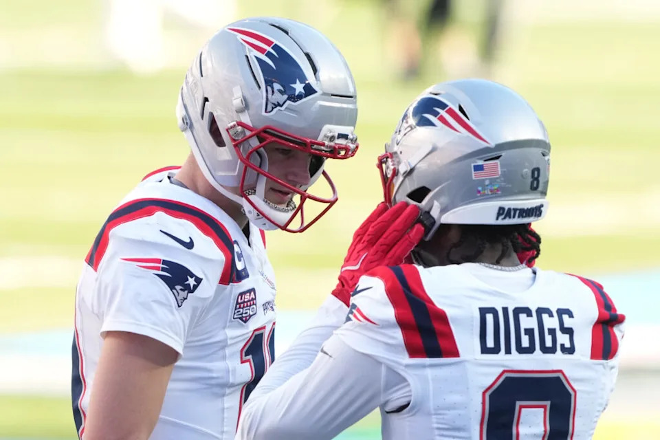 Feb 8, 2026; Santa Clara, CA, USA; New England Patriots quarterback Drake Maye (left) and wide receiver Stefon Diggs (8) talk before Super Bowl LX against the Seattle Seahawks at Levi’s Stadium. Mandatory Credit: Darren Yamashita-Imagn Images