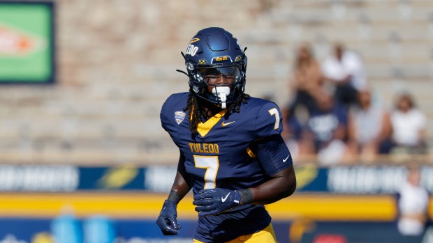 Toledo safety Emmanuel McNeil-Warren (7) pursues a play on defense against the Akron during an NCAA football game on Saturday, Sept. 27, 2025, in Toledo, Ohio. (AP Photo/Rick Osentoski)
