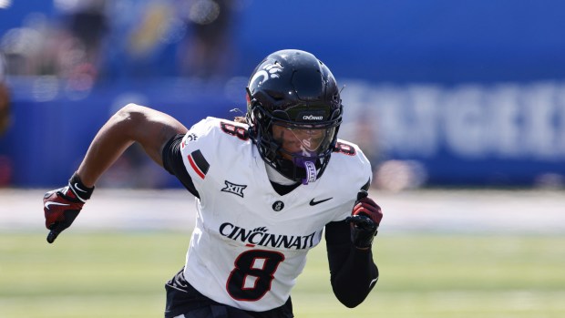 A football player runs