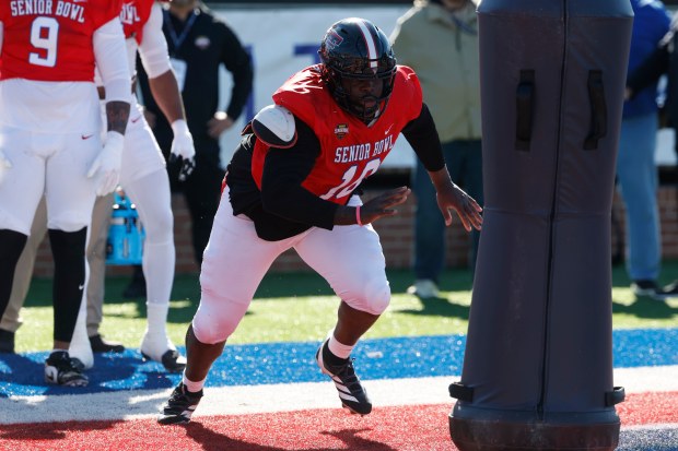 National Team defensive tackle Lee Hunter (10), of Texas Tech, runs through drills during practice for the Senior Bowl NCAA college football game Wednesday, Jan. 28, 2026, in Mobile, Ala. (AP Photo/Butch Dill)