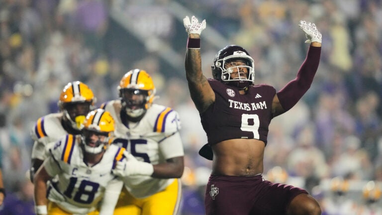 Texas A&M defensive end Cashius Howell (9) celebrates his sack of LSU quarterback Garrett Nussmeier (18) in the first half of an NCAA college football game, Saturday, Oct. 25, 2025 in Baton Rouge, La.