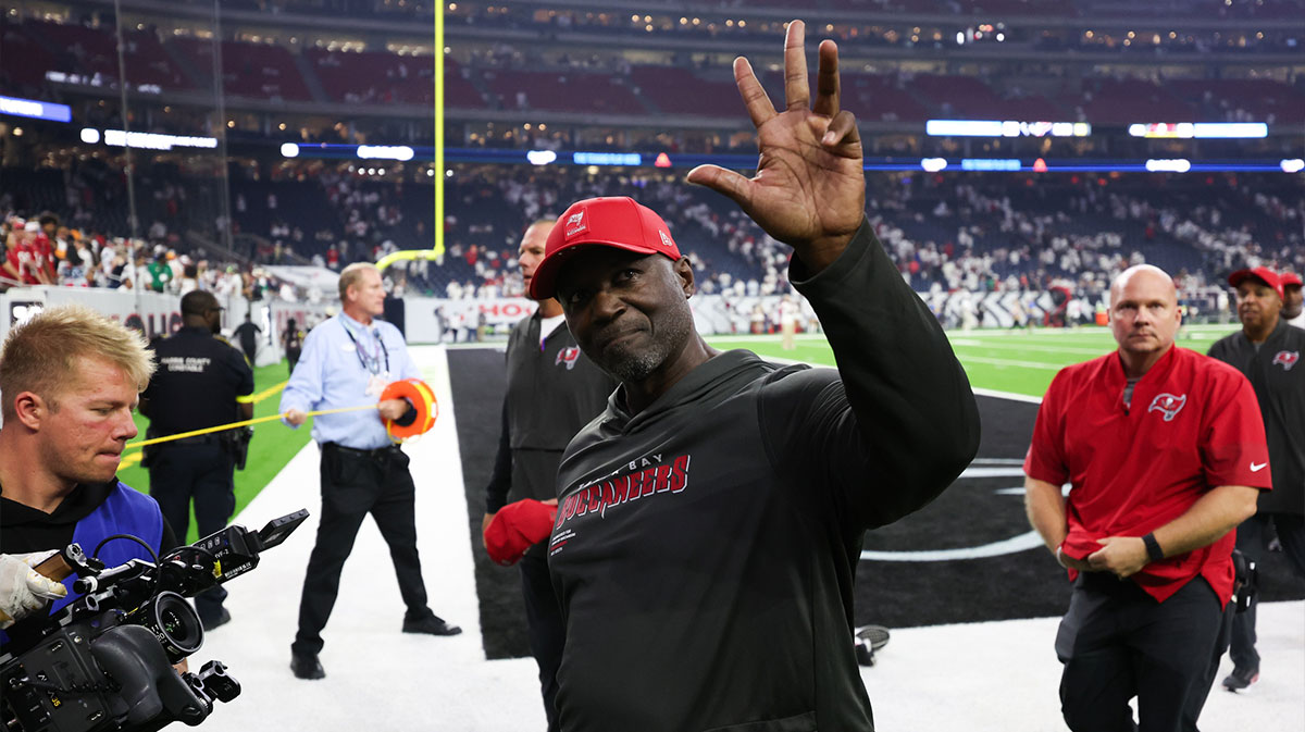 Tampa Bay Buccaneers head coach Todd Bowles waves to fans after the game against the Houston Texans at NRG Stadium.