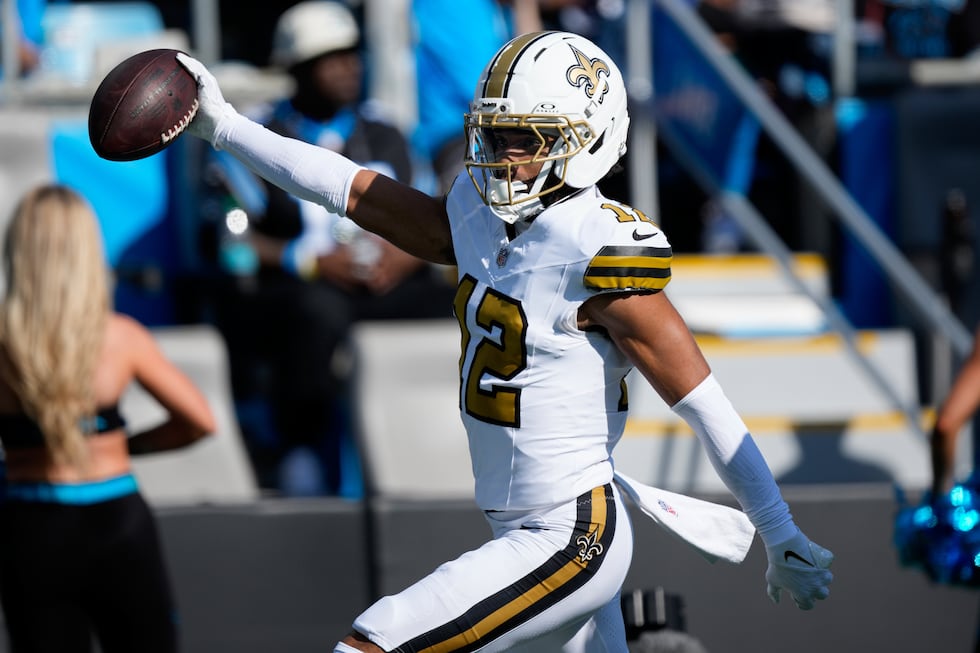 Saints wide receiver Chris Olave celebrates after scoring a first-half touchdown Sunday (Nov....