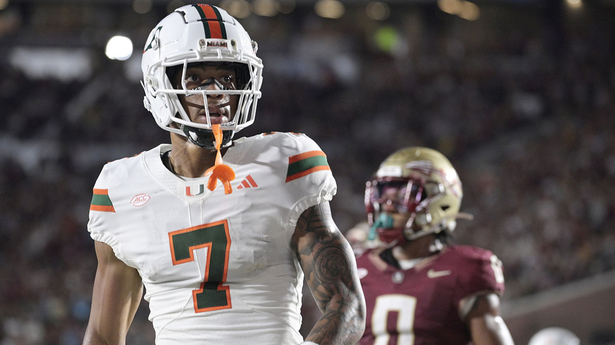 Miami Hurricanes wide receiver CJ Daniels (7) celebrates after a touchdown during the first half against the Florida State Seminoles at Doak S. Campbell Stadium.