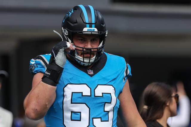 Panthers center Austin Corbett warms up before the game against the Bills the game at Bank of America Stadium in Charlotte, NC on Sunday, October 26, 2025.