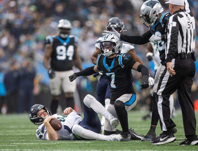 Carolina Panthers safety Tre'Von Moehrig celebrates after a sack against the Seattle Seahawks at the Bank of America Stadium in Charlotte on Dec. 28, 2025.