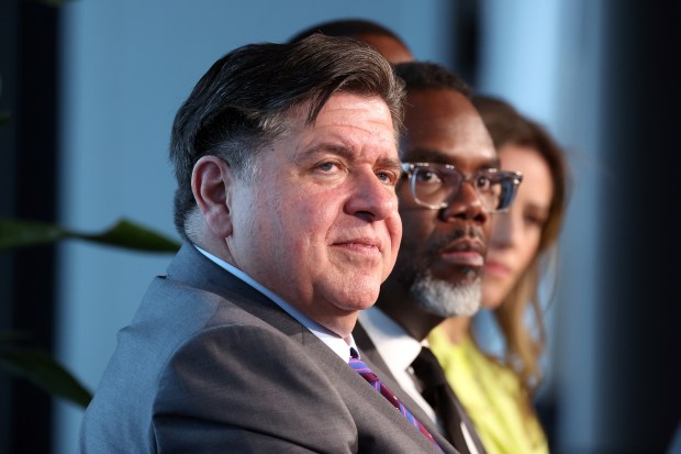 Gov. JB Pritzker, left, and Chicago Mayor Brandon Johnson attend a news conference in Chicago's Fulton Market neighborhood on Jan. 16, 2026. (Terrence Antonio James/Chicago Tribune)