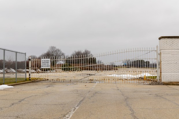 A gate remains at the former Arlington International Racecourse in Arlington Heights on Dec. 18, 2025. (Dominic Di Palermo/Chicago Tribune)