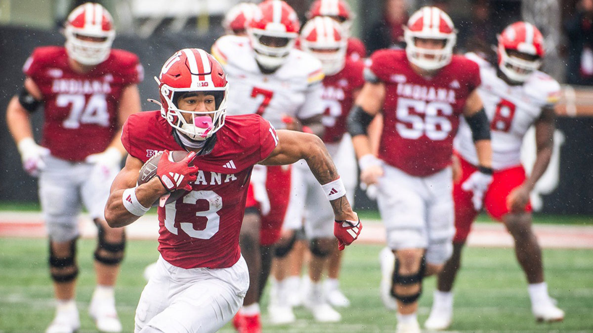 Indiana's Elijah Sarratt (13) runs after the catch during the Indiana versus Maryland football game at Memorial Stadium on Saturday, Sept. 28, 2024.