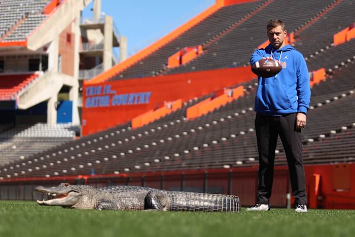 Florida coach Jon Sumrall's photoshoot with a 7-foot alligator includes some tense moments