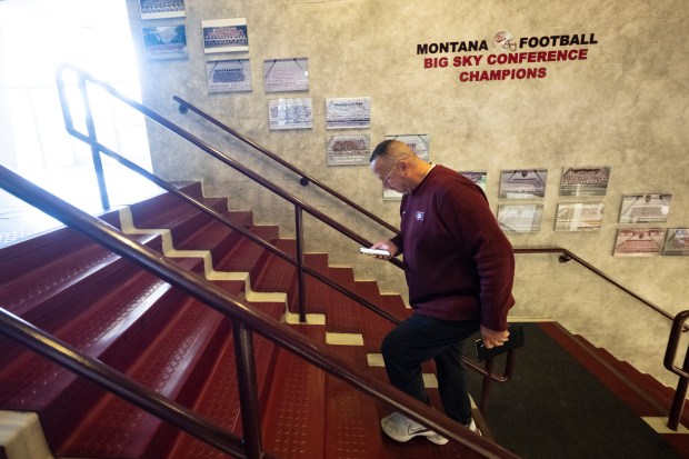 New University of Montana football coach Bobby Kennedy walks up stairs at the Washington-Grizzly Champions Center on his first day Feb. 5, 2026 in Missoula, Montana. Kennedy, 59, was hired after one year in the program to replace longtime head coach Bobby Hauck. Kennedy is from Boulder, Colorado, he played football at Boulder High School and at the University of Northern Colorado in Greeley before starting his coaching career. The Montana job is Kennedy's first as a head coach. (Courtesy/University of Montana, Tommy Martino).
