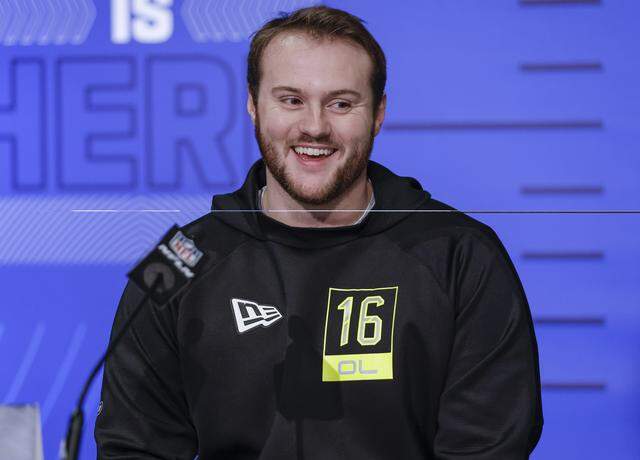 Luke Fortner #OL16 of the Kentucky Wildcats speaks to reporters during the NFL Draft Combine at the Indiana Convention Center on March 3, 2022 in Indianapolis, Indiana.