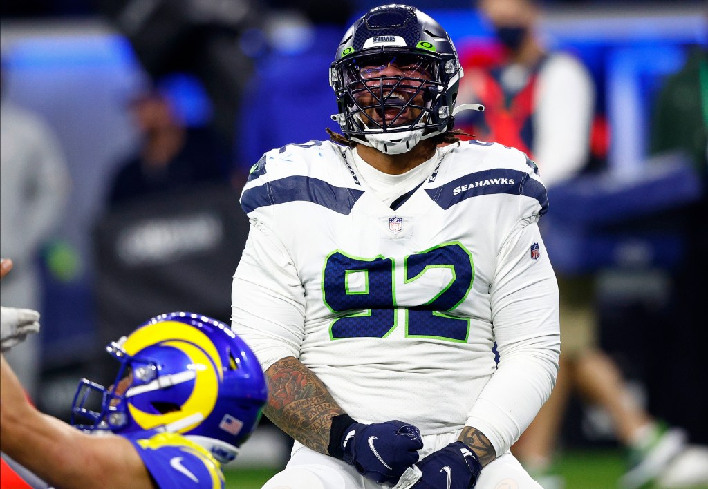 Robert Nkemdiche #92 of the Seattle Seahawks reacts after a sack against Matthew Stafford #9 of the Los Angeles Rams at SoFi Stadium on December 21, 2021 in Inglewood, California. 