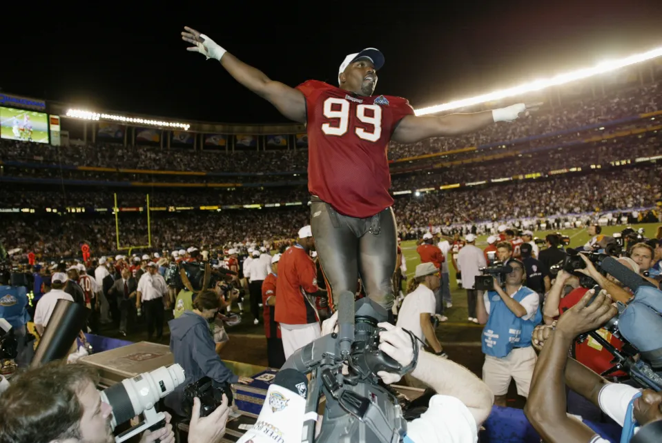 SAN DIEGO - JANUARY 26:  Defensive tackle Warren Sapp #99 of the Tampa Bay Buccaneers celebrates the victory over the Oakland Raiders in Super Bowl XXXVII at Qualcomm Stadium on January 26, 2003 in San Diego, California.  The Buccaneers won 48-21.  (Photo by Donald Miralle/Getty Images)
