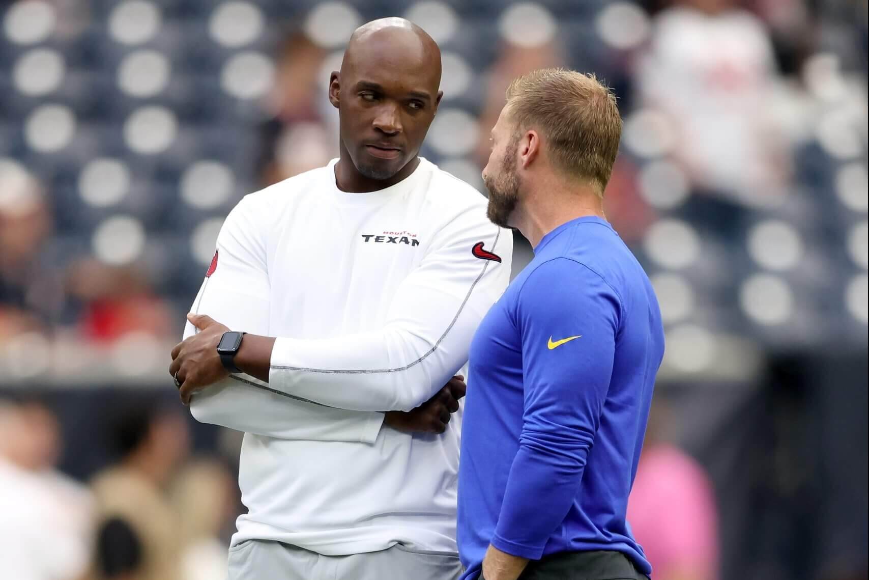 Head coach DeMeco Ryans of the Houston Texans talks with head coach Sean McVay of the Los Angeles Rams during the preseason game at NRG Stadium on August 24, 2024 in Houston, Texas. (Photo by