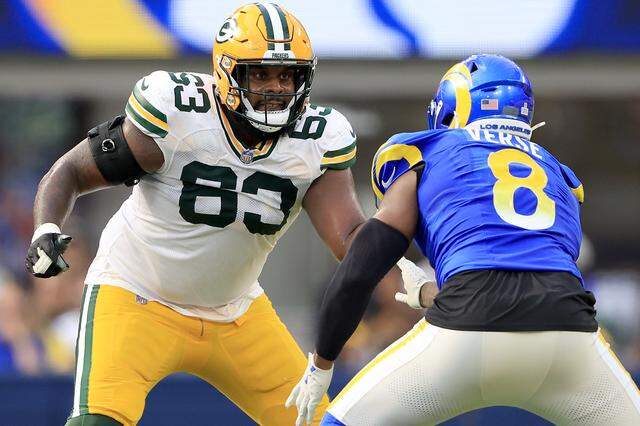 Rasheed Walker, pictured here as a member of the Green Bay Packers, blocks Los Angeles Rams defensive lineman Jared Verse during at SoFi Stadium on Oct. 06, 2024 in Inglewood, California.