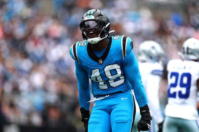 Carolina Panthers linebacker Thomas Incoom reacts after a tackle in the game against the Dallas Cowboys at Bank of America Stadium on October 12, 2025 in Charlotte, North Carolina. (Photo by Grant Halverson/Getty Images)