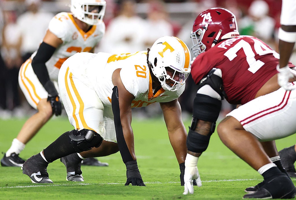 TUSCALOOSA, ALABAMA - OCTOBER 18: Bryson Eason #20 of the Tennessee Volunteers lines up against Kadyn Proctor #74 of the Alabama Crimson Tide during the first quarter at Bryant-Denny Stadium on October 18, 2025 in Tuscaloosa, Alabama. (Photo by Kevin C. Cox/Getty Images)