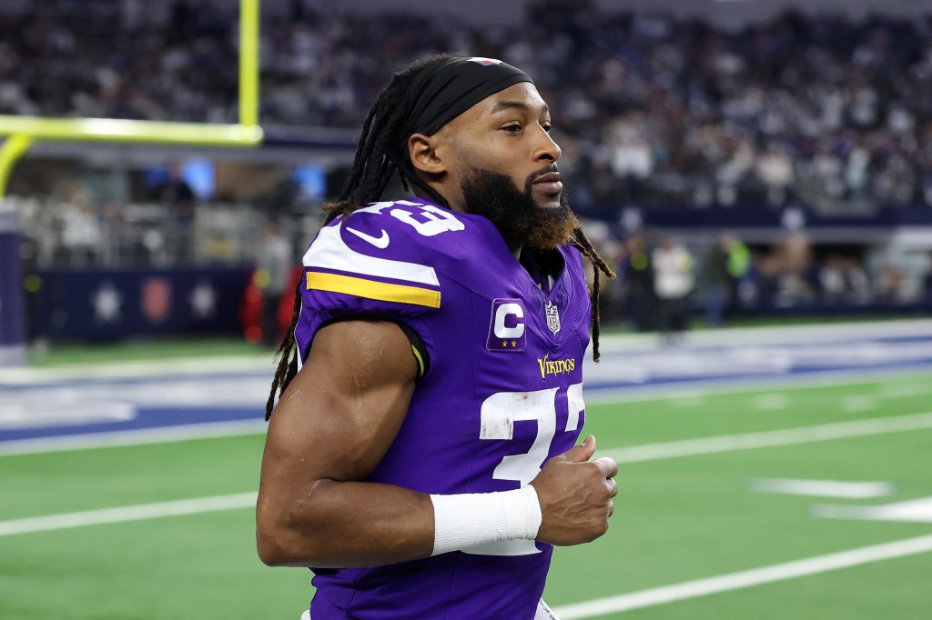 Aaron Jones Sr. participates in warmups prior to a game against the Dallas Cowboys at AT&T Stadium on December 14, 2025 in Arlington, Texas.