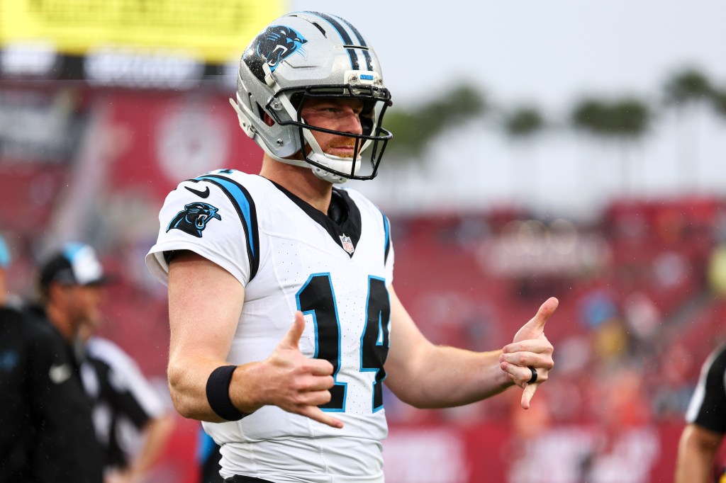 Andy Dalton #14 of the Carolina Panthers warms up prior to an NFL football game against the Tampa Bay Buccaneers at Raymond James Stadium on January 3, 2026 in Tampa, Florida.