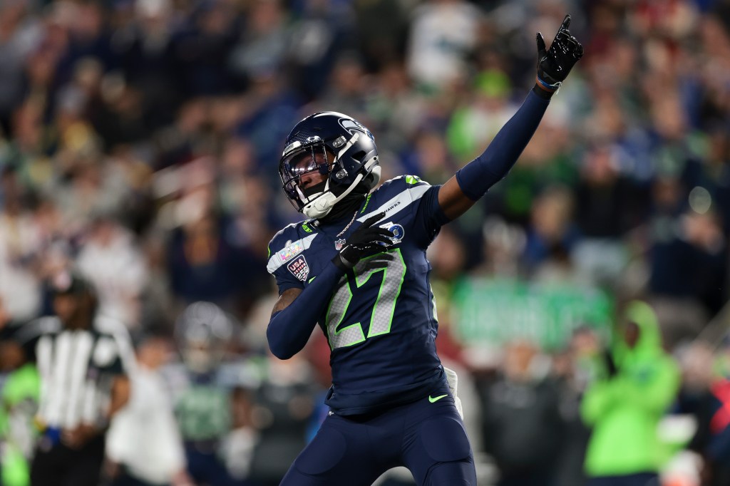 Riq Woolen #27 of the Seattle Seahawks reacts to a defensive stop against the New England Patriots during the second half of the Super Bowl LX at Levi's Stadium on February 08, 2026 in Santa Clara, California. 