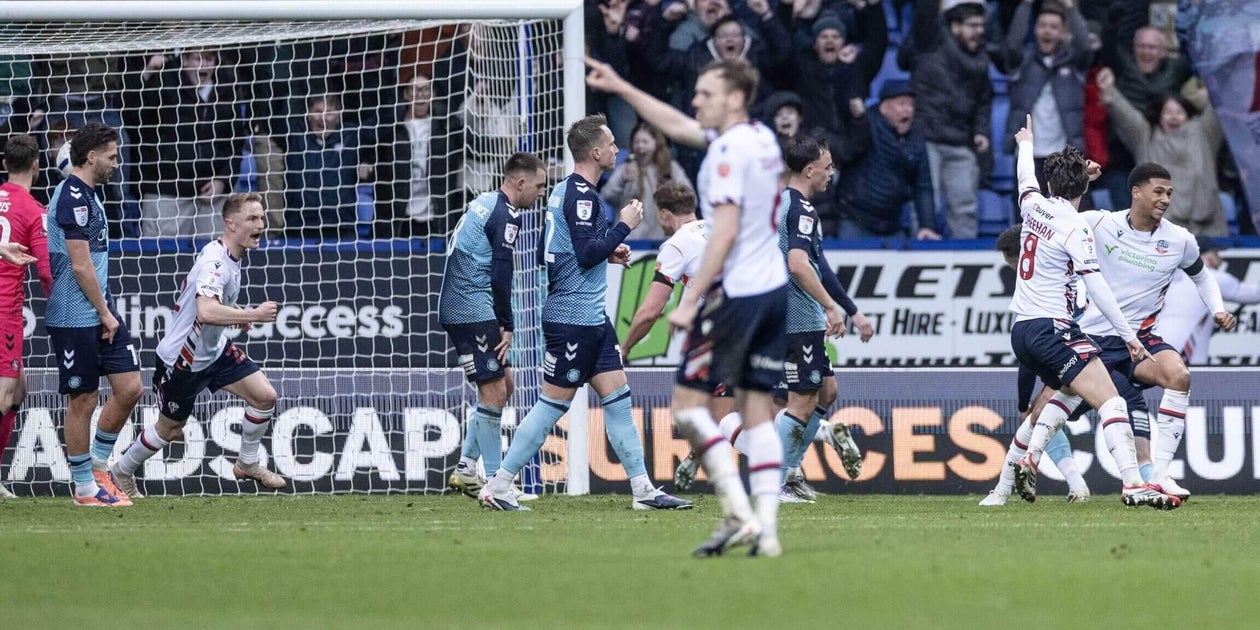 ‘We’re hating every second of it’: What it feels like to watch football history made — against your team