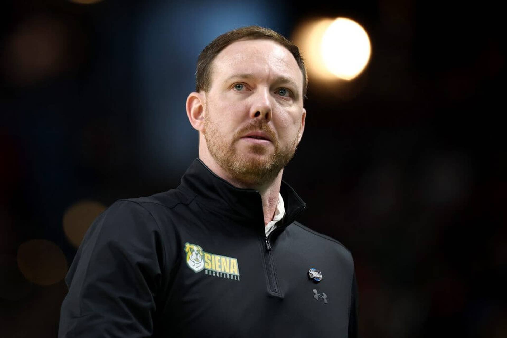 Siena men's basketball coach Gerry McNamara looks on during an NCAA Tournament game against Duke.