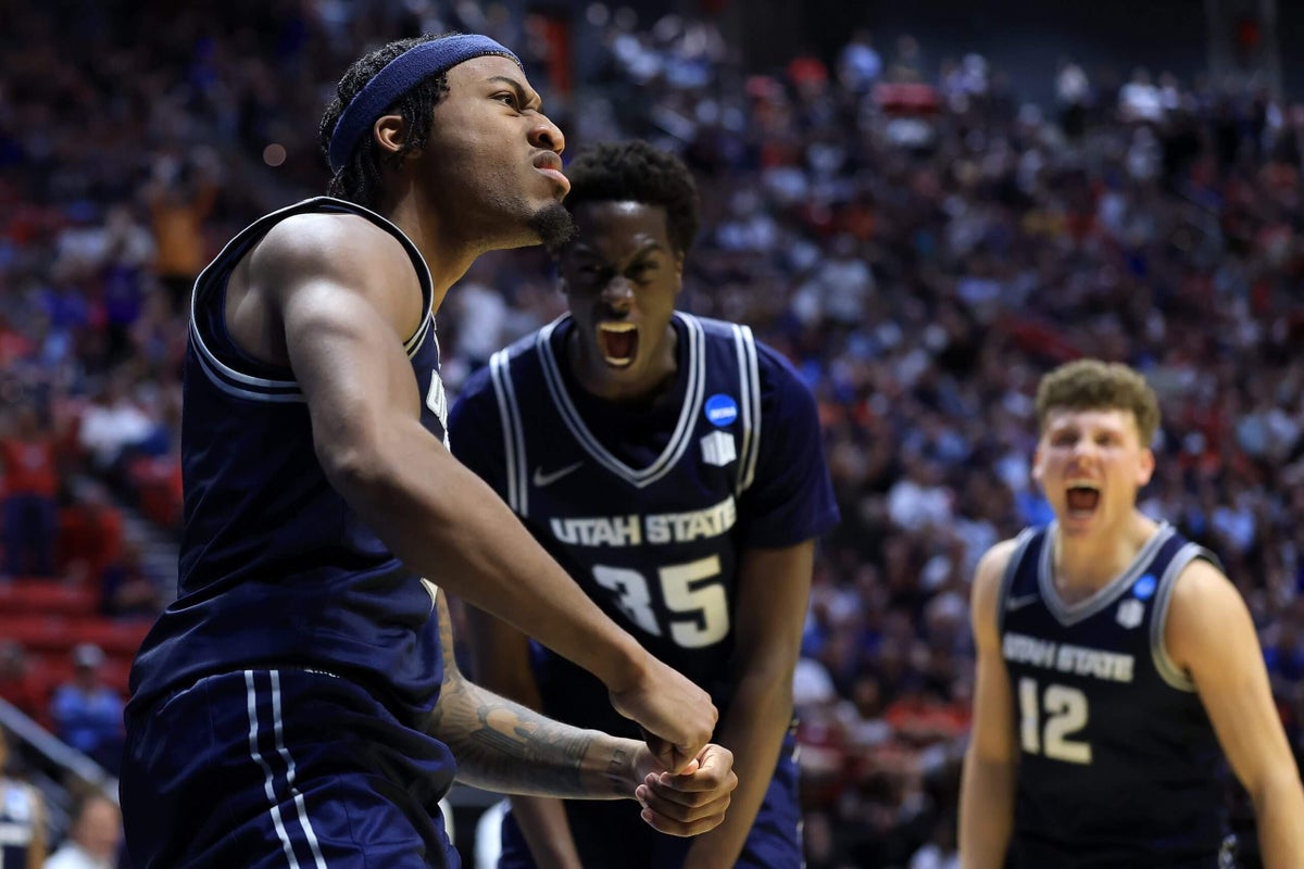 Utah State can’t match college basketball’s spending or keep a coach. It wins anyway