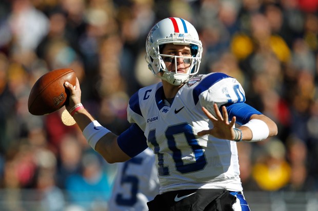 Logan Kilgore #10 of the Middle Tennessee Blue Raiders looks to throw during a game against the Navy Midshipmen during the Bell Helicopter Armed Forces Bowl at Amon G. Carter Stadium on Dec. 30, 2013, in Fort Worth, Texas. (Photo by Sarah Glenn/Getty Images)