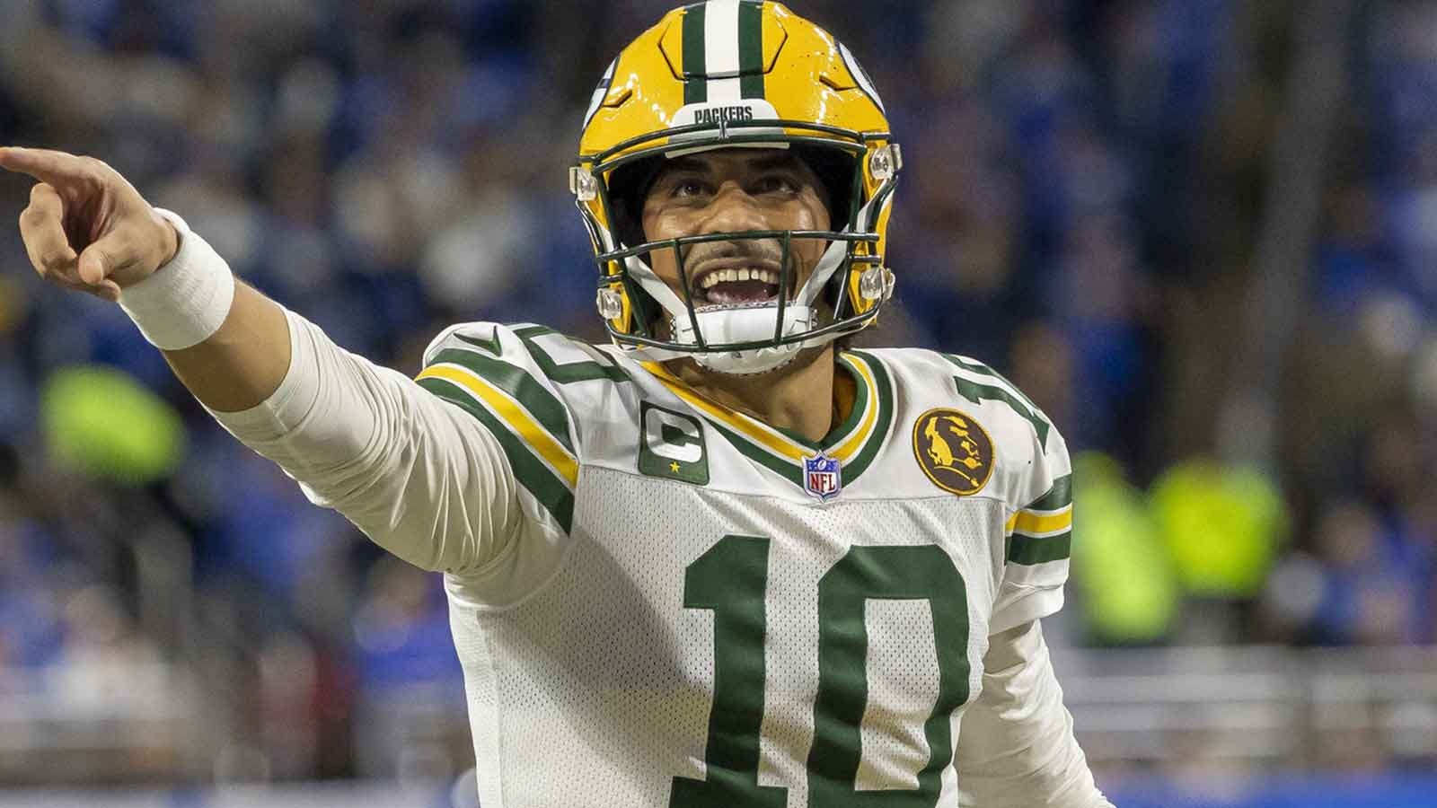 Green Bay Packers quarterback Jordan Love (10) calls a play against the Detroit Lions during the second quarter at Ford Field.