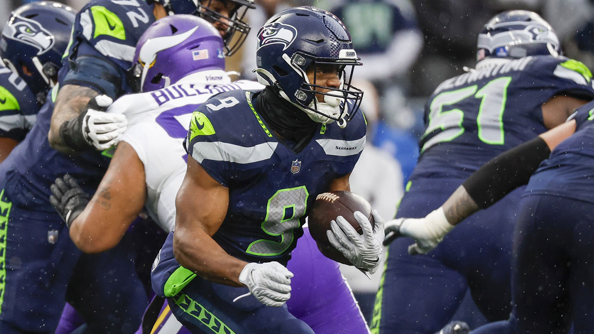 Seattle Seahawks running back Kenneth Walker III (9) rushes against the Minnesota Vikings during the first quarter at Lumen Field.