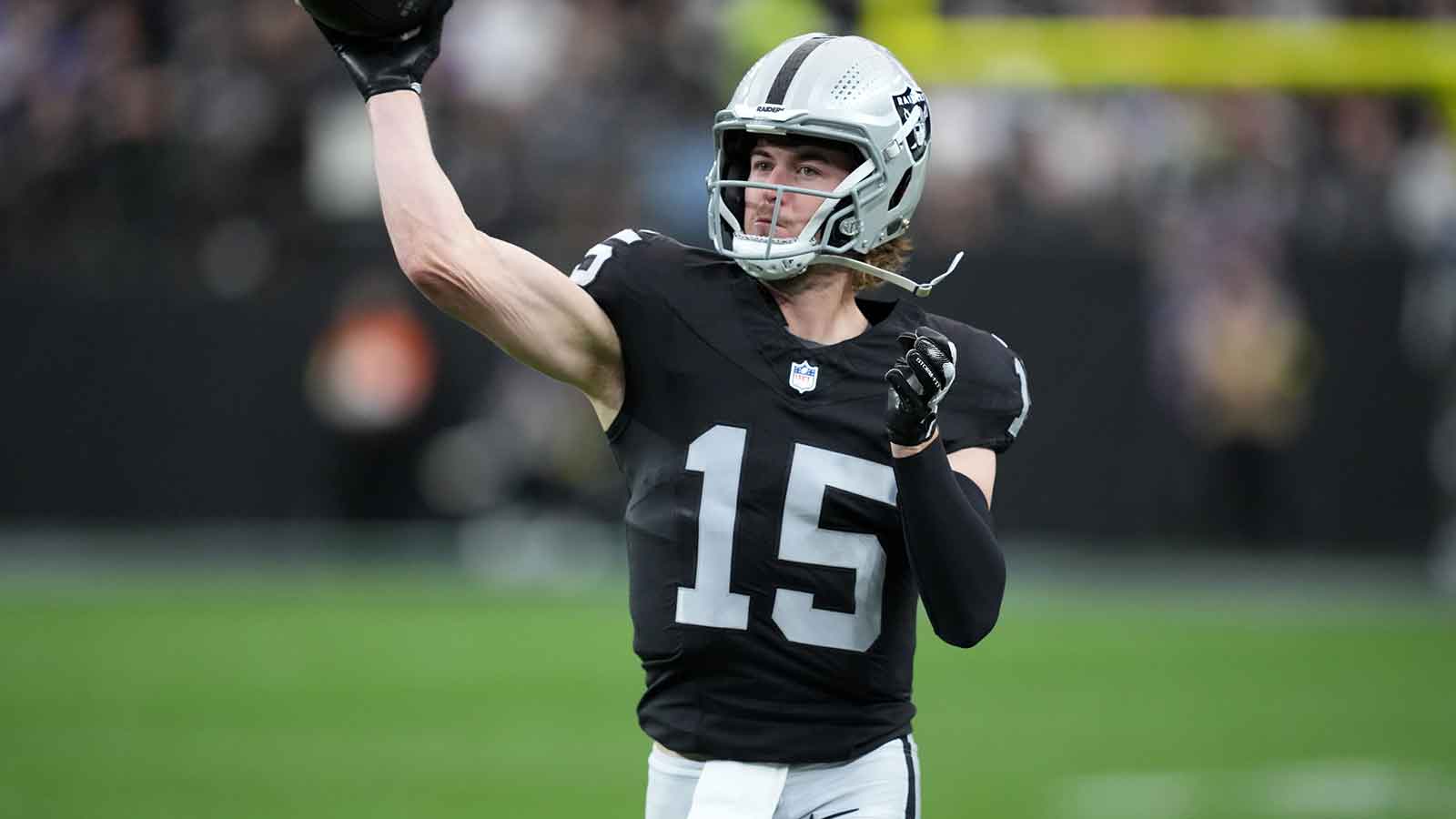 Las Vegas Raiders quarterback Kenny Pickett (15) throws the ball against the New York Giants