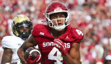 Feb 24, 2026; Columbia, South Carolina, USA; Kentucky Wildcats guard Otega Oweh (00) drives around South Carolina Gamecocks guard Meechie Johnson (5) during the second half at Colonial Life Arena. Mandatory Credit: Jeff Blake-Imagn