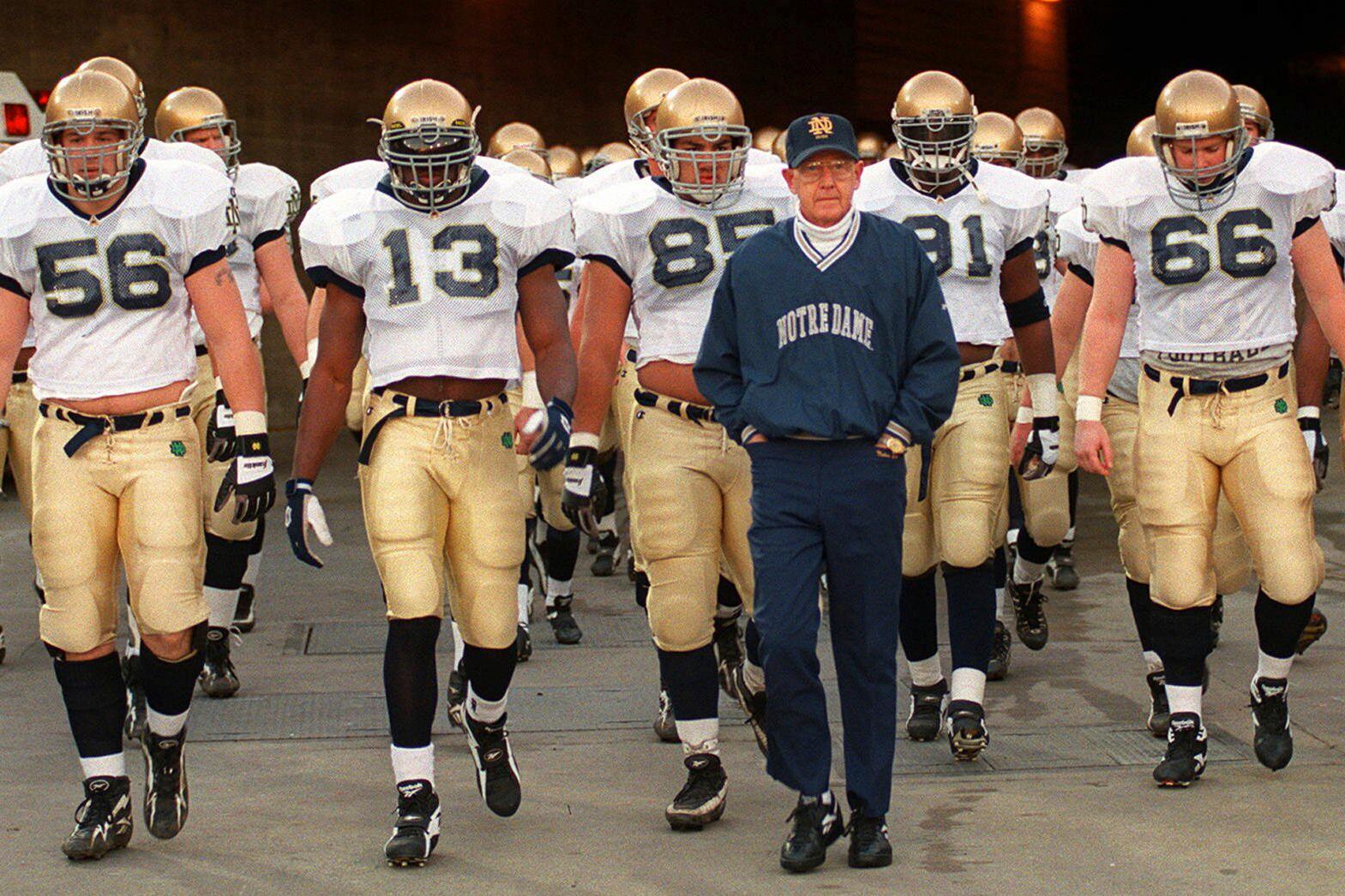 FILE – Notre Dame’s head coach Lou Holtz and the...