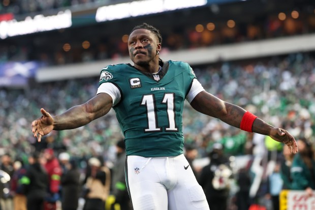 Philadelphia Eagles wide receiver A.J. Brown gestures towards the crowd during pre-game warm-ups before an NFL wild card playoff game against the San Francisco 49ers, Sunday, Jan. 11, 2026, in Philadelphia. (AP Photo/Terrance Williams)