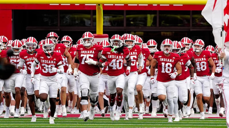 BLOOMINGTON, IN - OCTOBER 18: Indiana Hoosiers run onto the field before a game against the Michigan State Spartans on October 18, 2025 at Memorial Stadium in Bloomington, Indiana. (Photo by Brian Spurlock/Icon Sportswire via Getty Images)